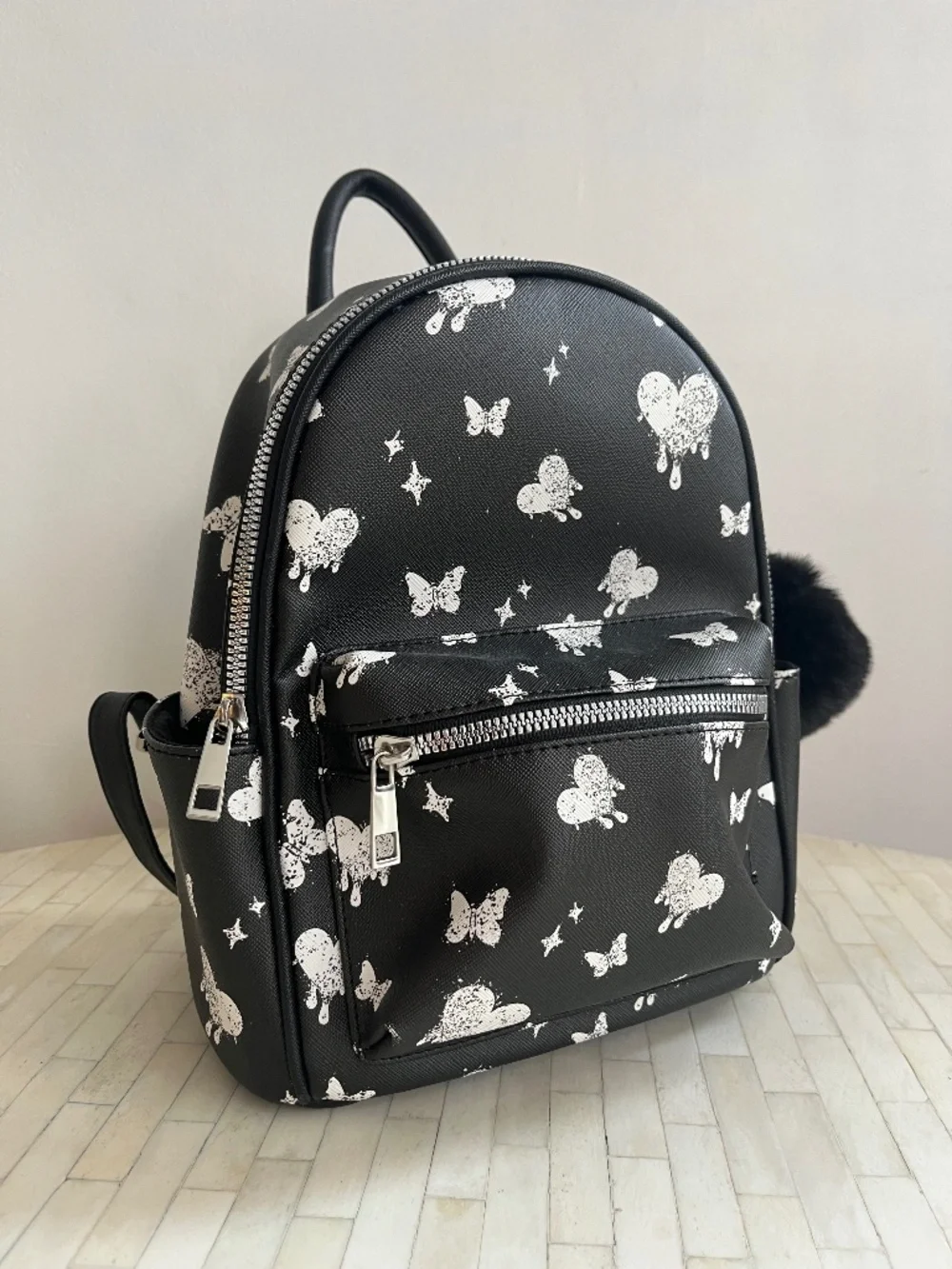 Mini Backpack — Black Butterfly & Heart Print with Pom Pom Charm